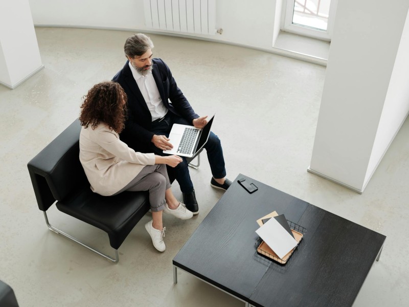 Team discussing service benefits