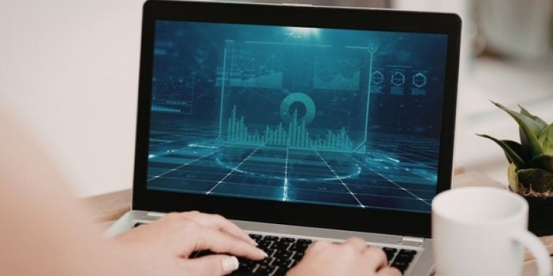 Modern office workspace with laptops and notes